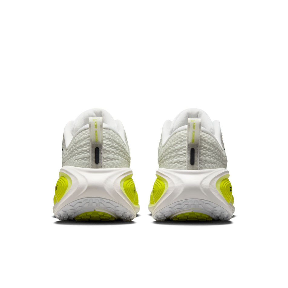 The back of a pair of Nike Women's Vomero Plus Road Running Shoes in the White/Black-Cyber-Light Lemon Twist colourway.