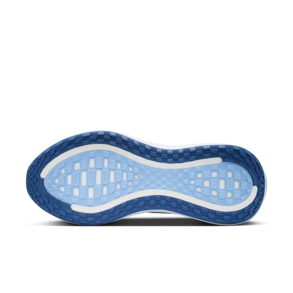 The outsole of the left shoe from a pair of Nike Women's Vomero Plus Road Running Shoes in the White/Mystic Navy-Aluminum-Football Grey colourway.