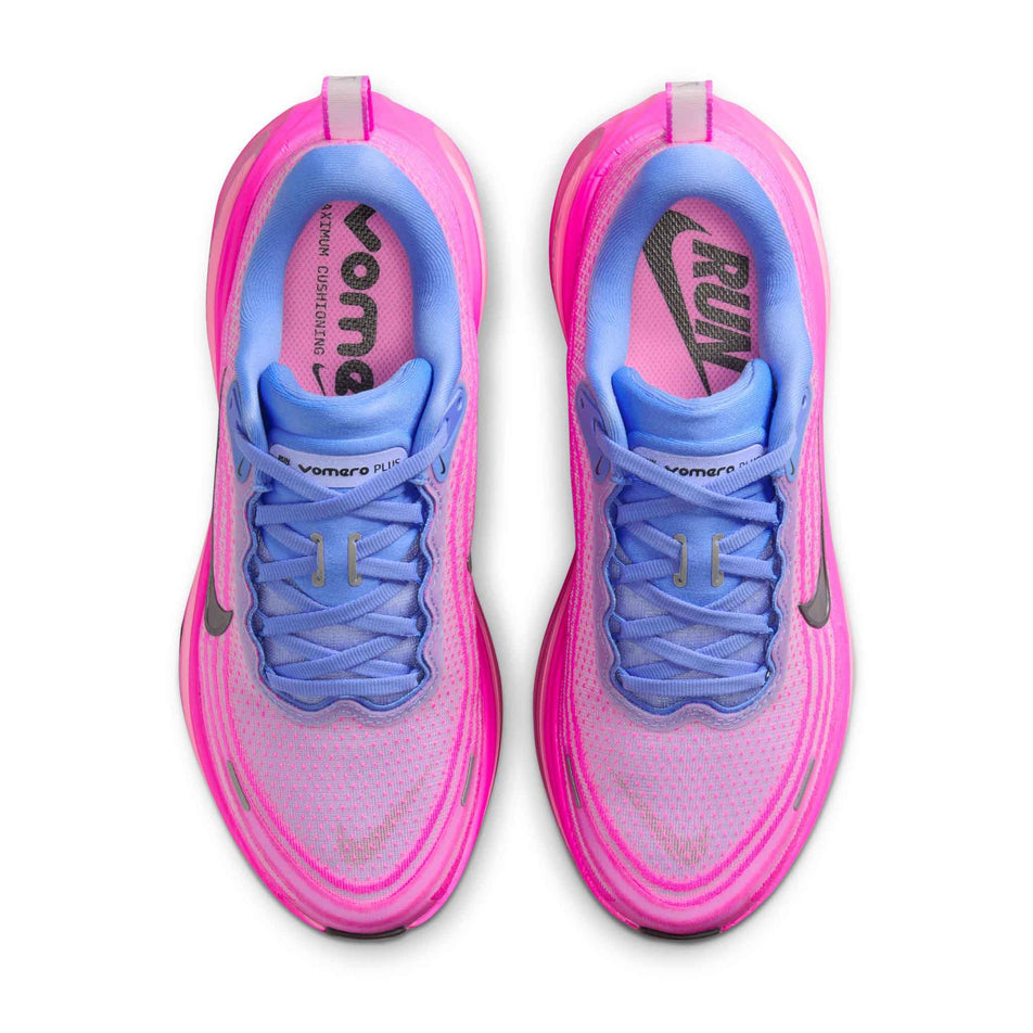 The uppers of a pair of Nike Women's Vomero Plus Road Running Shoes in the Royal Pulse/Metallic Dark Grey-Fire Pink colourway. (8725329608866)