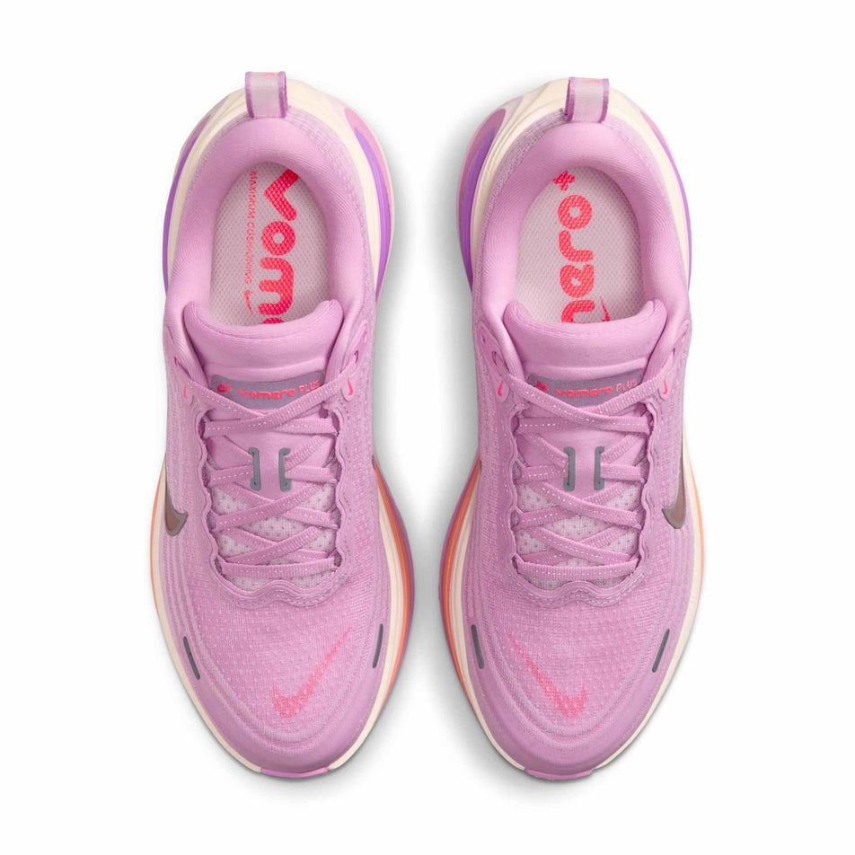 The uppers of a pair of Nike Women's Vomero Plus Road Running Shoes in the Light Magenta/Black-Pink Foam-Bright Violet colourway.
