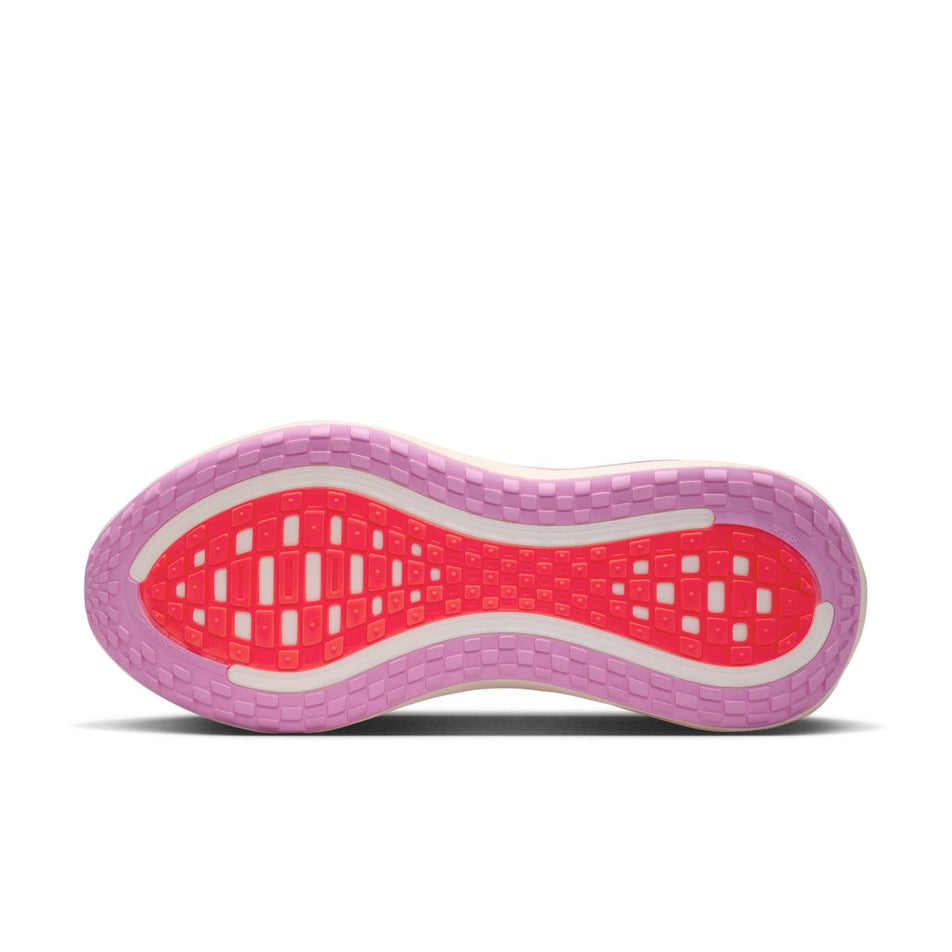 The outsole of the left shoe from a pair of Nike Women's Vomero Plus Road Running Shoes in the Light Magenta/Black-Pink Foam-Bright Violet colourway.