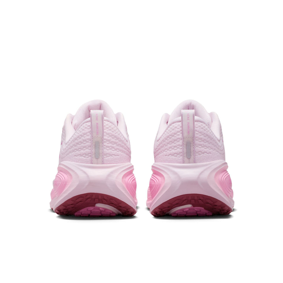 The back of a pair of Nike Women's Vomero Plus Road Running Shoes in the Bleached Lilac/Light Magenta-Pink Rise colourway.