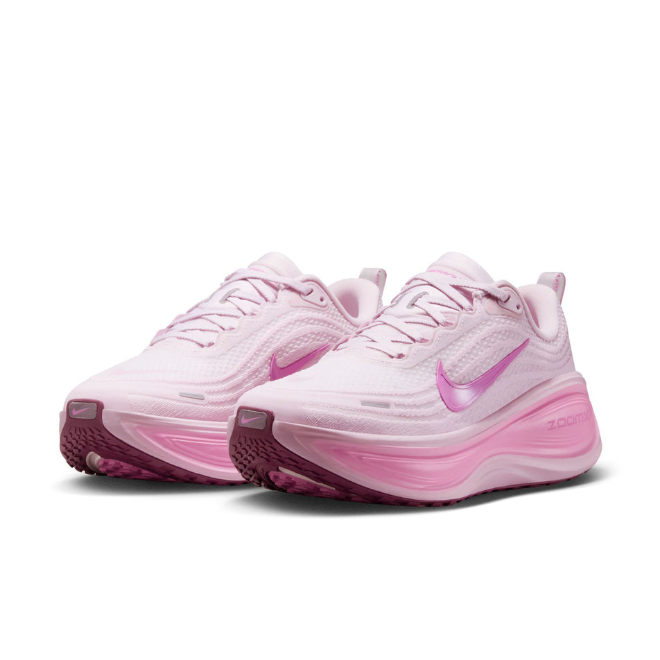 A pair of Nike Women's Vomero Plus Road Running Shoes in the Bleached Lilac/Light Magenta-Pink Rise colourway.