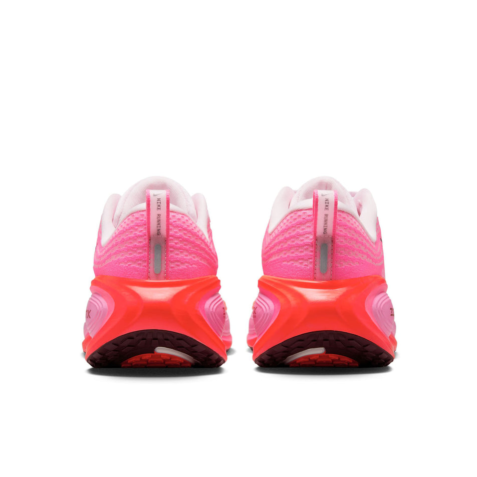 The back of a pair of Nike Women's Vomero Plus Road Running Shoes in the Hyper Pink/Burgundy Crush colourway. (8736251773090)