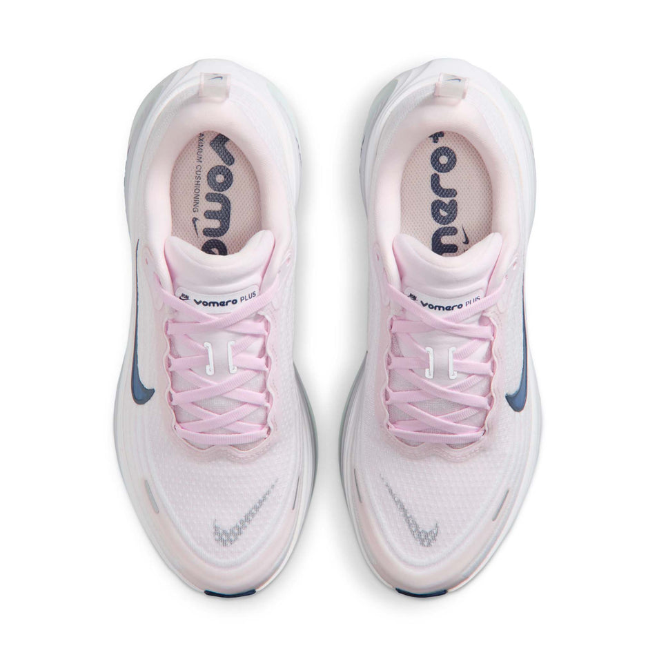 The uppers of a pair of Nike Women's Vomero Plus Road Running Shoes in the Pearl Pink/Midnight Navy-White colourway.