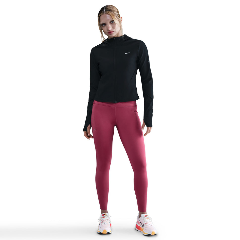 Front view of a model wearing the Nike Women's Swift Therma-FIT Running Jacket in the Black/Reflective Silver colourway.