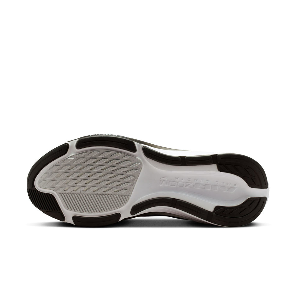 The outsole of the left shoe from a pair of Nike Men's Pegasus 42 Road Running Shoes in the Black/White-Photon Dust colourway.