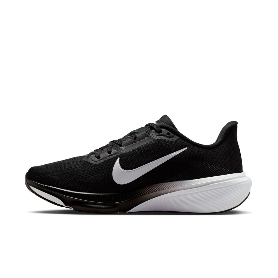 Medial view of the right shoe from a pair of Nike Women's Pegasus 42 Road Running Shoes in the Black/White-Iron Grey colourway.