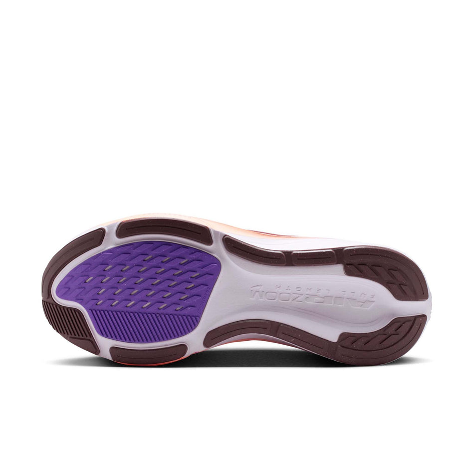 The outsole of the left shoe from a pair of Nike Women's Pegasus 42 Road Running Shoes in the Chalk/Tattoo-Orange Pulse-Bright Violet colourway.