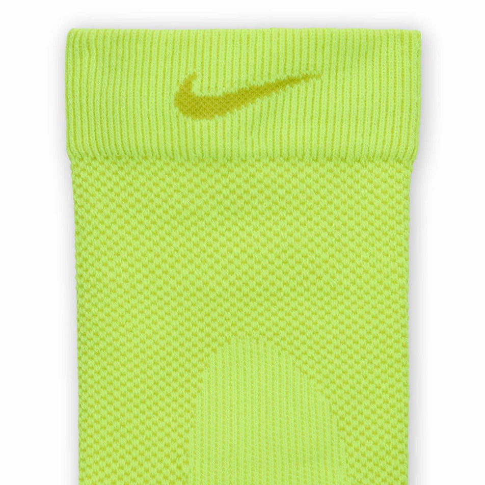 Close-up view of the cuff of one of the socks from a pair of Nike Lightweight Running Micro Crew Socks in the Volt/Bright Cactus/Black/Bright Cactus colourway.
