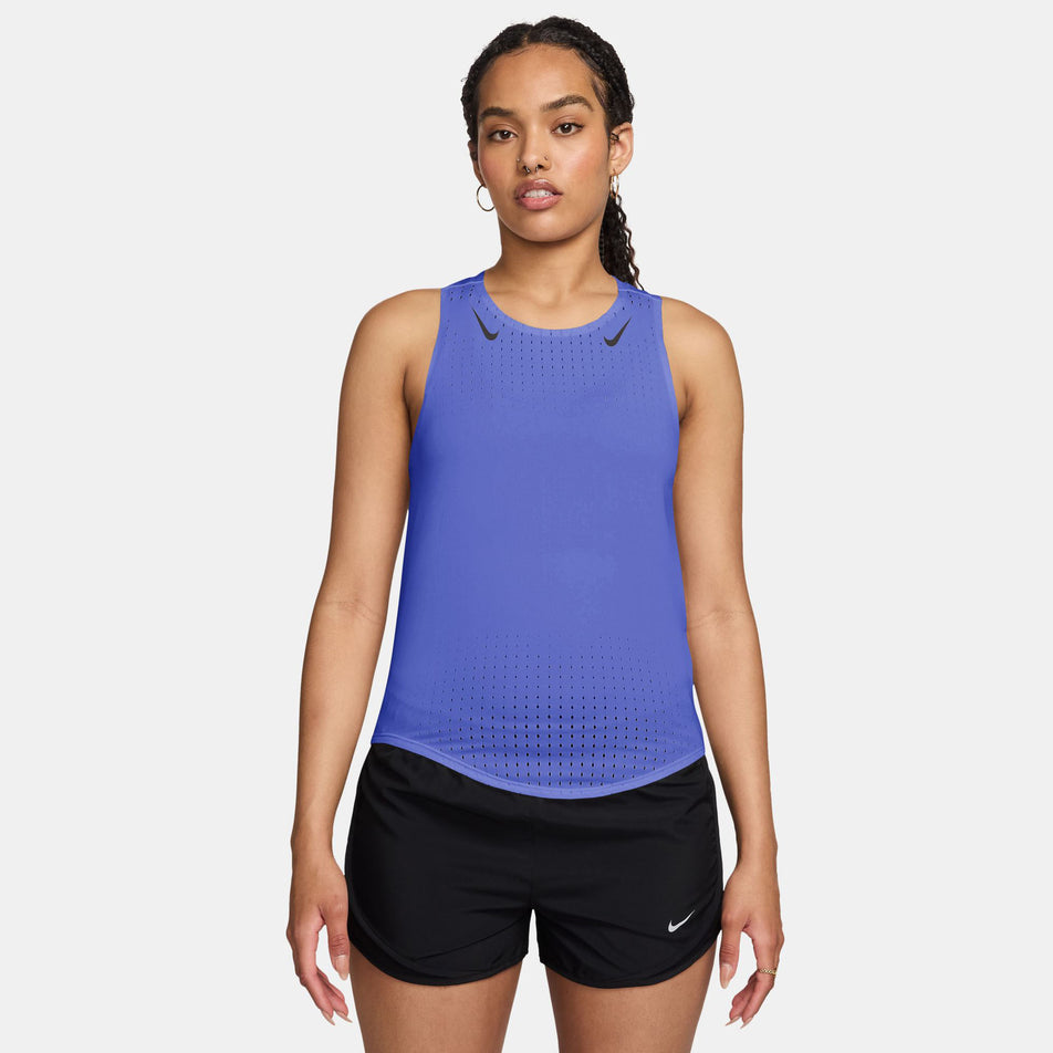 Front view of a model wearing the Nike Women's AeroSwift Dri-FIT ADV Running Singlet in the Sapphire/Black colourway.