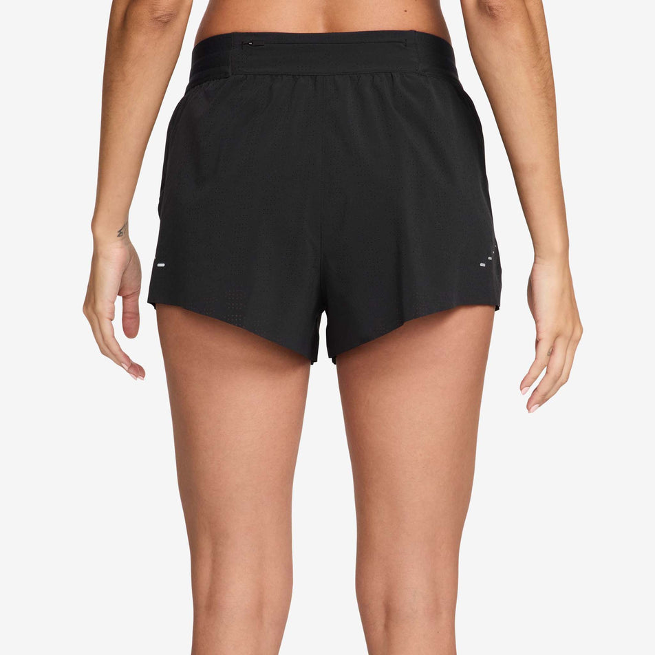 Back view of a model wearing the Nike Women's Swift Breathe Dri-FIT Mid-Rise 2.5