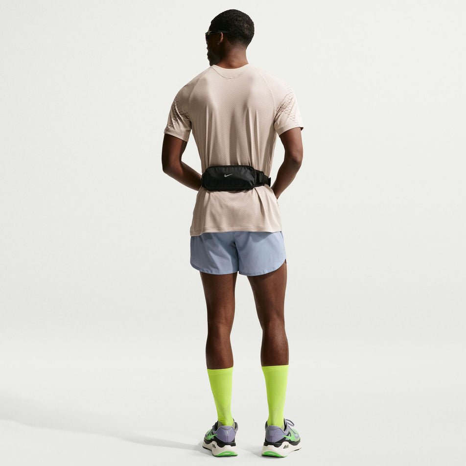 Back view of a model wearing the Nike Men's Stride Dri-FIT 5