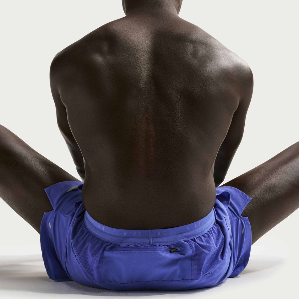 Back view of a model wearing the Nike Men's Stride Dri-FIT 5