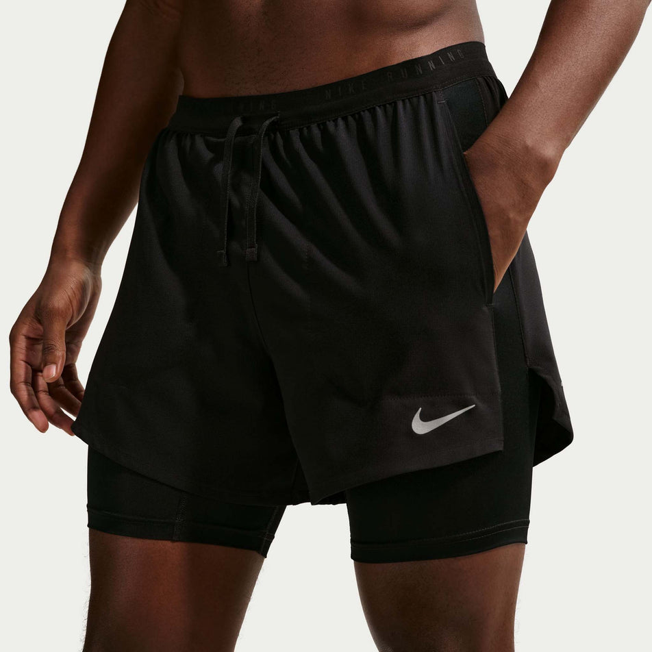 Front view of a model wearing the Nike Men's Stride Dri-FIT 5