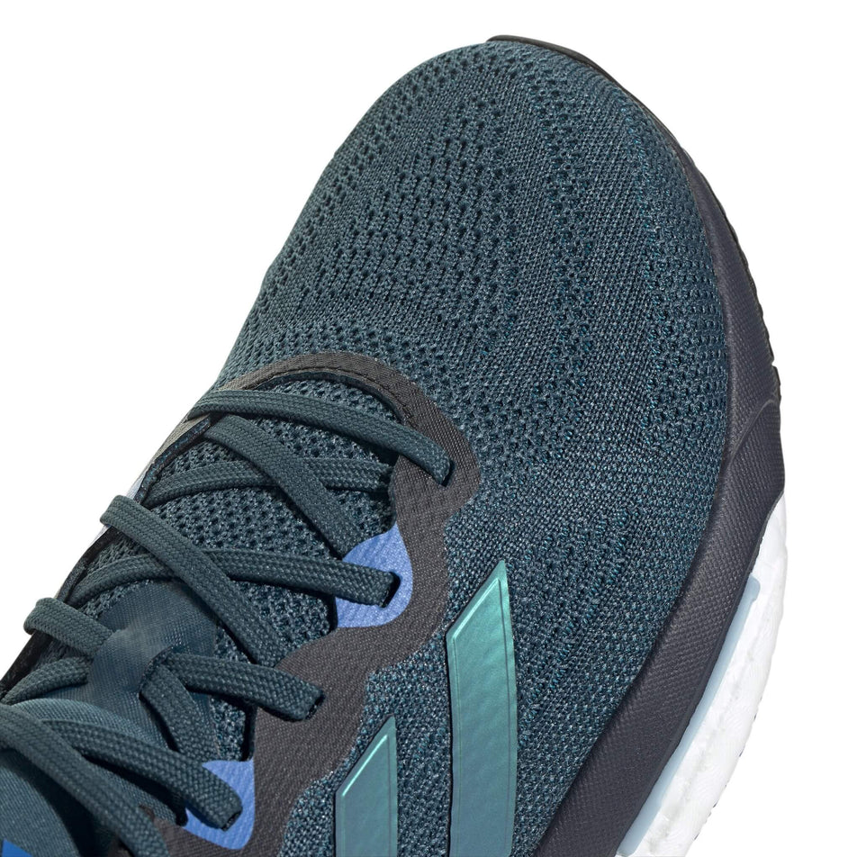 Lateral side of the front part of the right shoe from a pair of adidas Men's Solarglide 6 Running Shoes in the Arctic Night/Core Black/Arctic Fusion colourway (7969125171362)