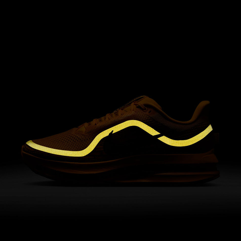 The reflective graphic on the lateral side of the left shoe from a pair of Nike Men's Pegasus Premium Road Running Shoes in the University Gold/Black-Laser Orange colourway. (8683467800738)