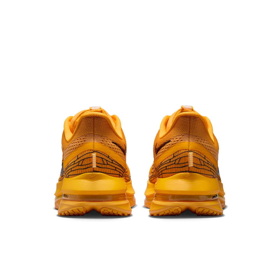 The back of a pair of Nike Men's Pegasus Premium Road Running Shoes in the University Gold/Black-Laser Orange colourway. (8683467800738)