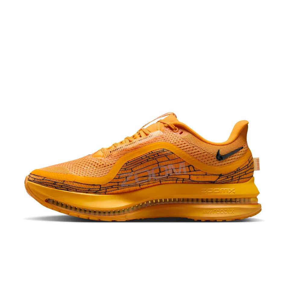 Medial view of the right shoe from a pair of Nike Men's Pegasus Premium Road Running Shoes in the University Gold/Black-Laser Orange colourway. (8683467800738)