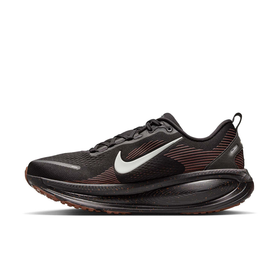 Medial view of the right shoe from a pair of Nike Men's Vomero 18 Road Running Shoes in the Black/Ironstone-Velvet Brown colourway. (8724276379810)