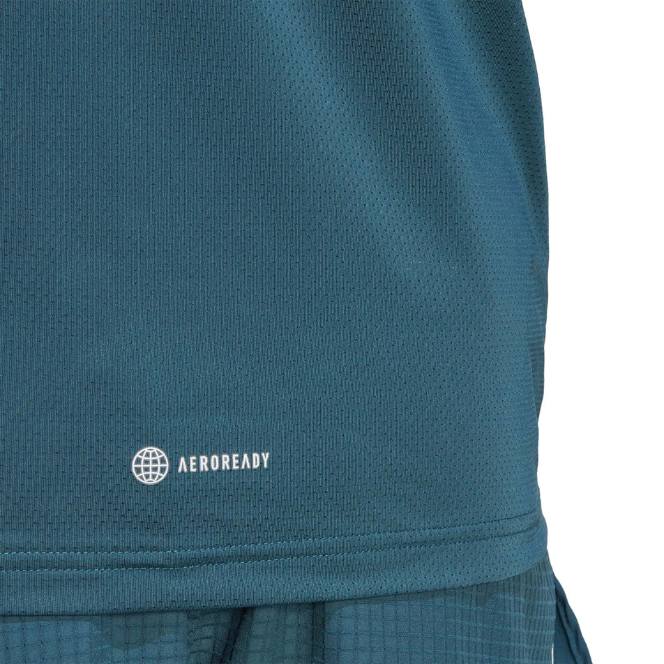 Lower left section of an adidas Men's Run Icons 3-Stripes Long Sleeve Top in the Arctic Night colourway. Aeroready call-out is visible.  (8005293670562)
