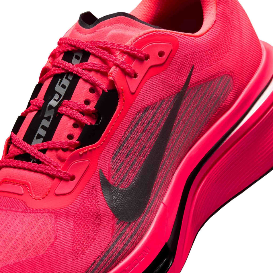 Close-up view of the upper of the left shoe from a pair of Nike Men's Pegasus Plus 2 Road Running Shoes in the Flash Crimson/Metallic Silver-Black colourway.