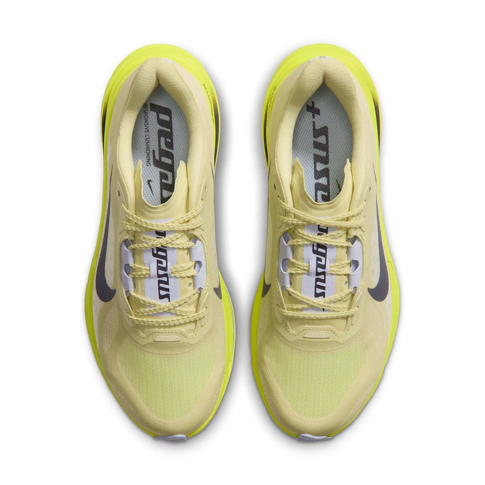 The uppers of a pair of Nike Women's Pegasus Plus 2 Road Running Shoes in the Fennel/Gridiron-Lemon Venom colourway.