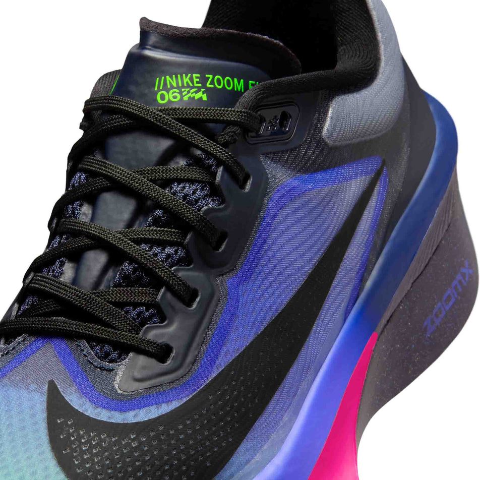 Close-up view of the upper of the left shoe from a pair of Nike Women's Zoom Fly 6 Road Running Shoes in the Dark Obsidian/Black-Racer Blue colourway.