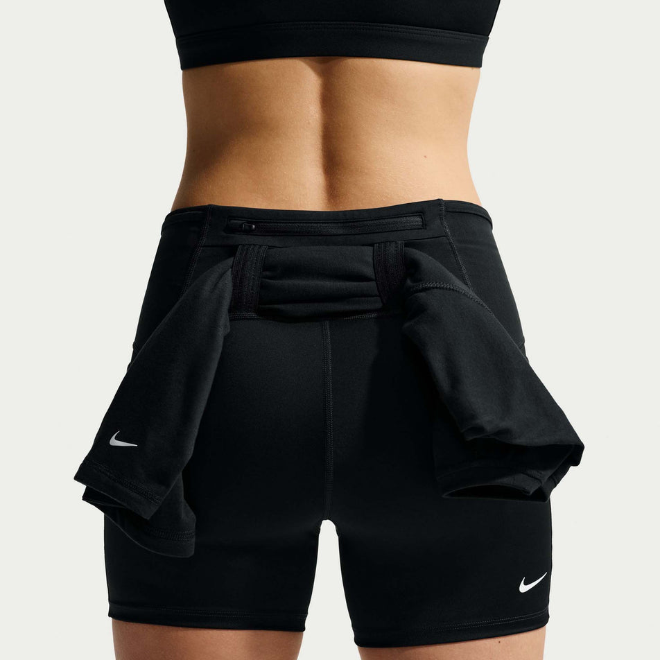 Back view of a model wearing the Nike Women's ACG Dri-FIT High-Waisted 4