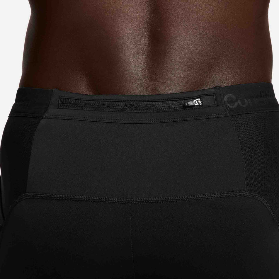 The zip pocket on the back of the Nike Men's ACG 