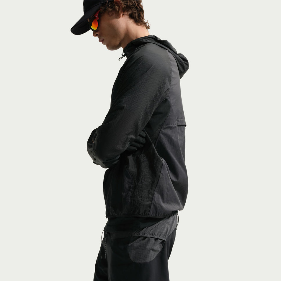 Side view of a model wearing the Nike Men's ACG 