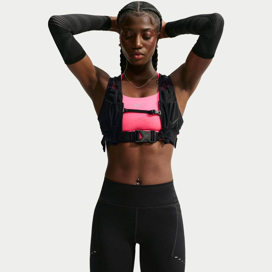 Front view of a model wearing the Nike Women's Swift Dri-FIT High-Waisted 7