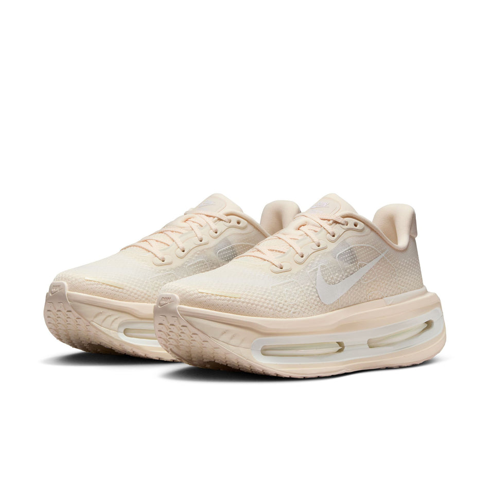 A pair of Nike Women's Vomero Premium Road Running Shoes in the  Chalk/White-Pale Ivory-Summit White colourway.
