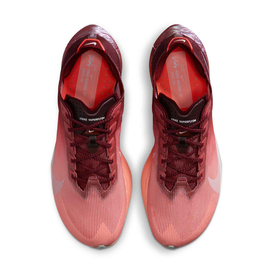 The uppers of a pair of Nike Women's Vaporfly 4 SE Road Racing Shoes in the Team Red/Barely Green-Atomic Pink colourway.
