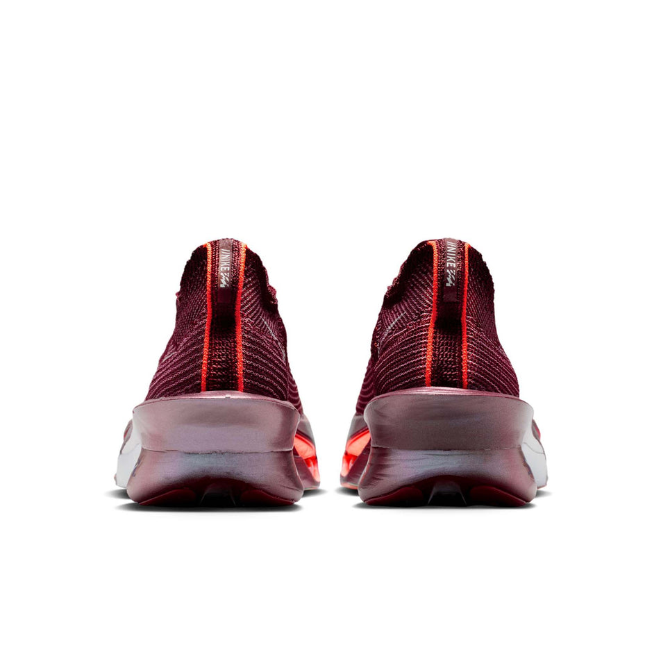 The back of a pair of Nike Women's Alphafly 3 Road Racing Shoes in the Team Red/Barely Green-Bright Crimson colourway.