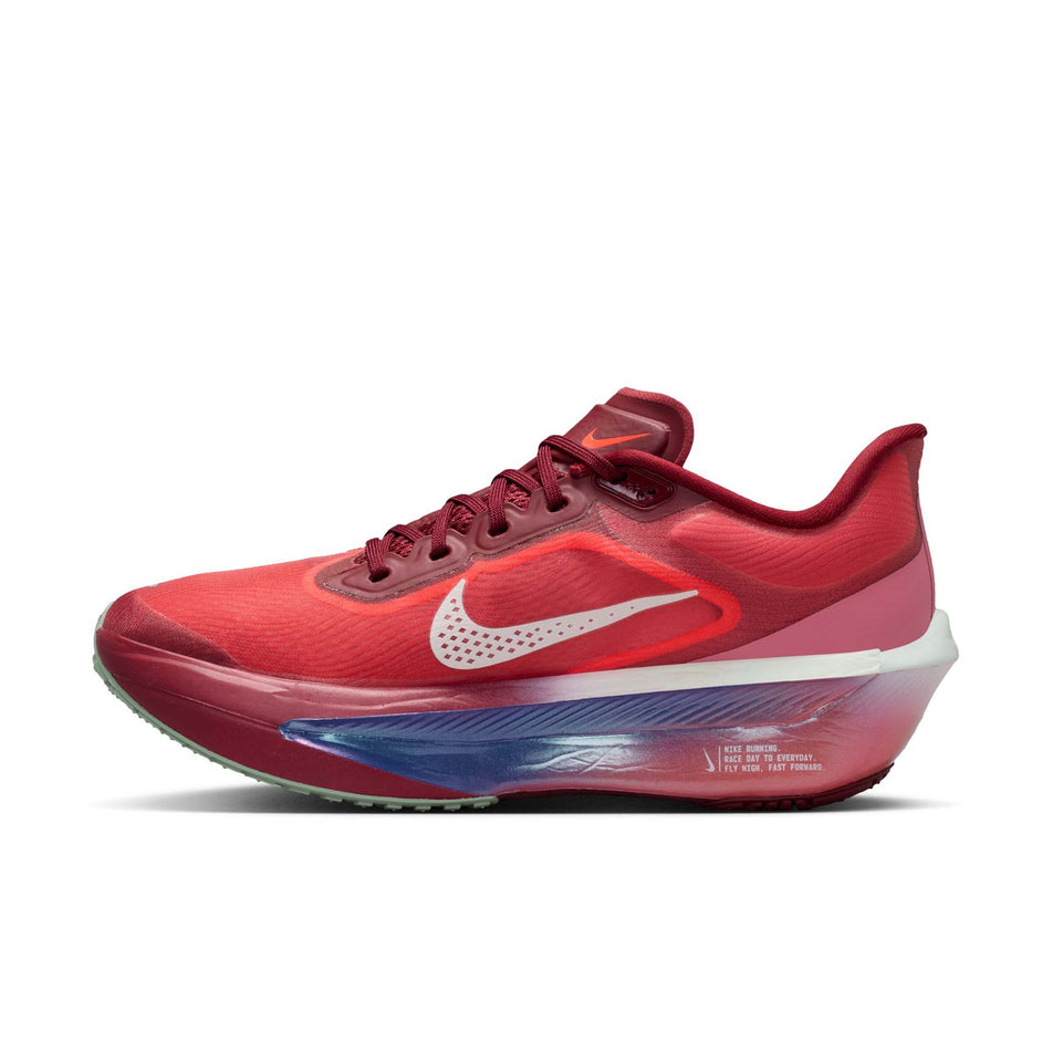 Medial view of the right shoe from a pair of Nike Women's Zoom Fly 6 SE Road Running Shoes in the Team Red/Barely Green-Bright Crimson colourway.