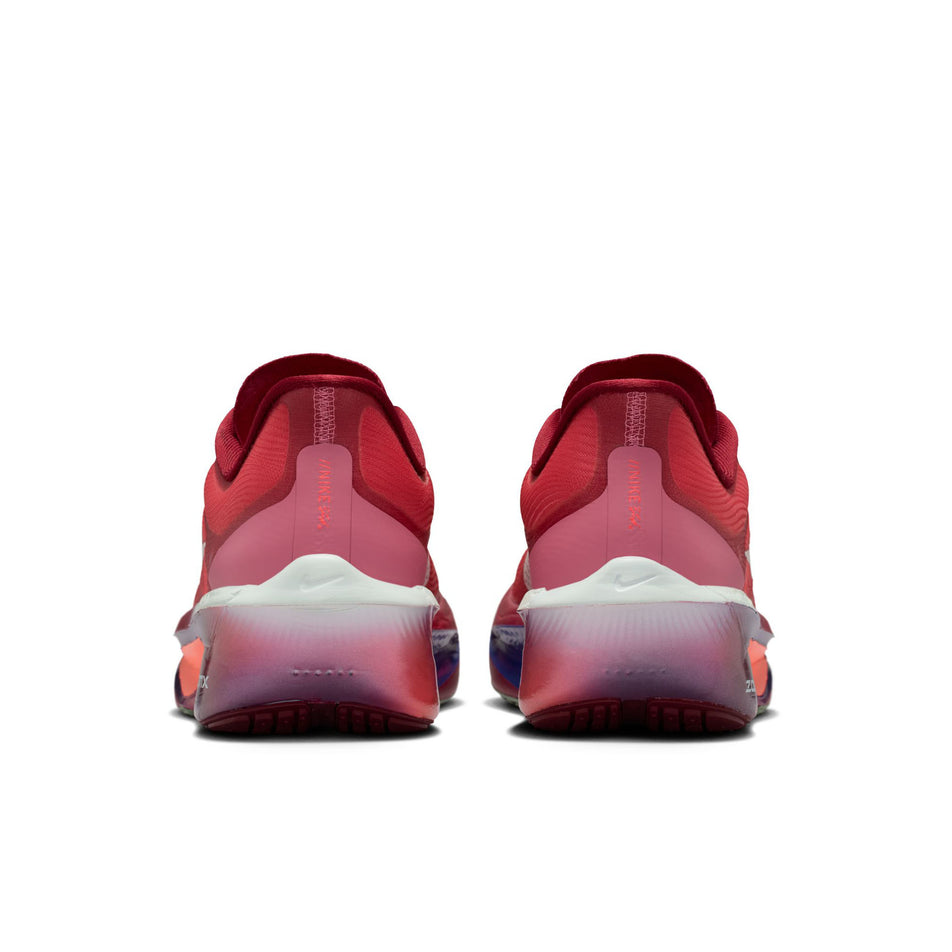 The back of a pair of Nike Women's Zoom Fly 6 SE Road Running Shoes in the Team Red/Barely Green-Bright Crimson colourway.