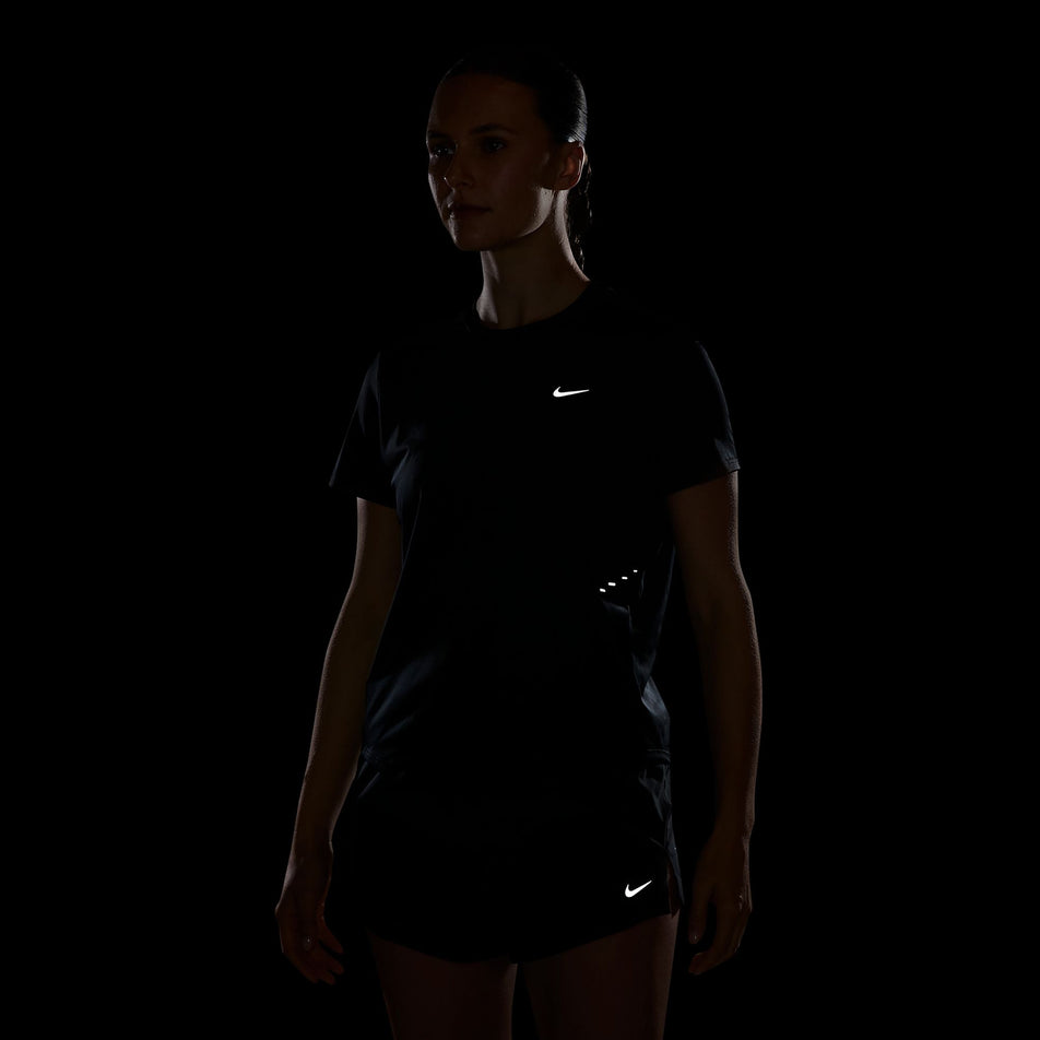 The reflective details on the Nike Women's Swift Dri-FIT Short-Sleeve Running Top in the Black/Reflective Silver colourway.
