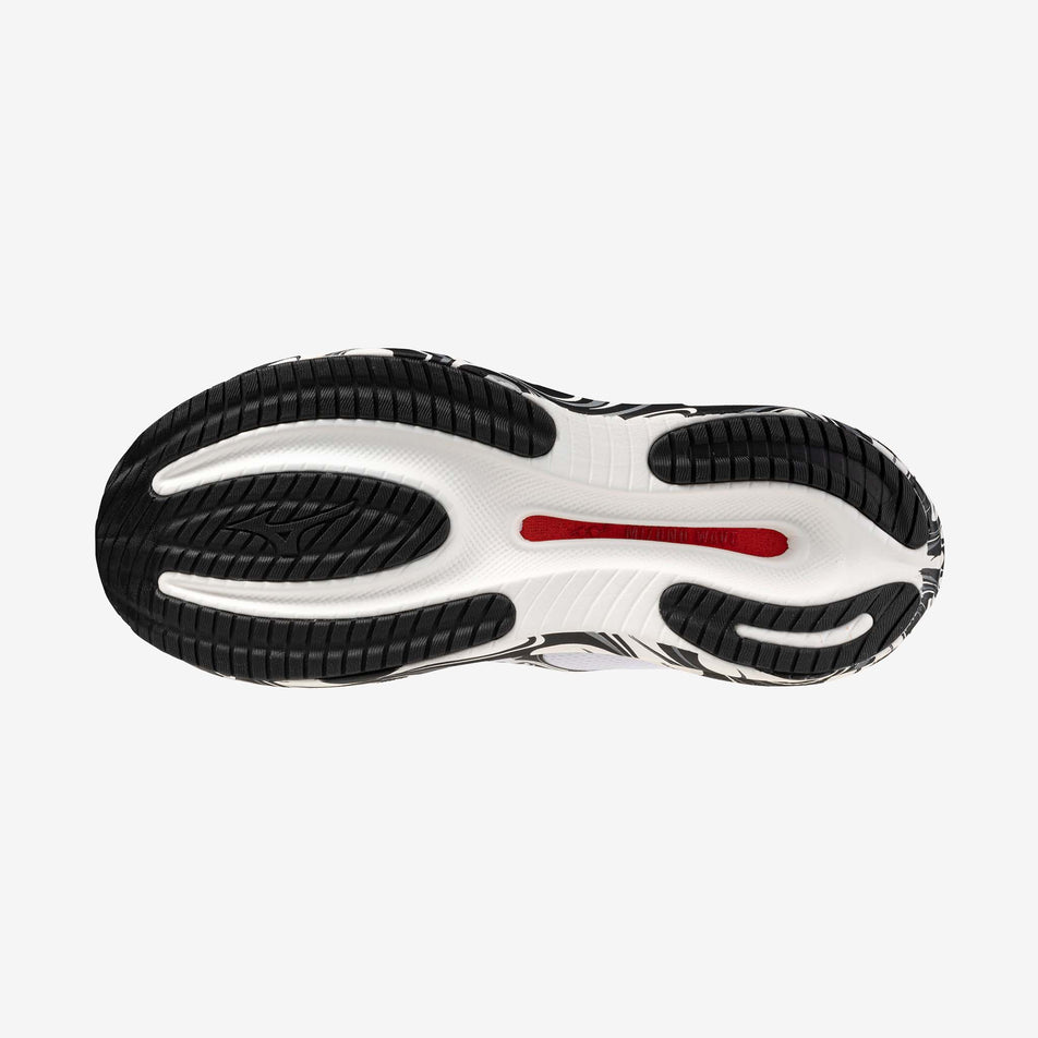 The outsole of the left shoe from a pair of Mizuno Unisex Wave Rider 30 Disclosure Running Shoes in the White/Black/High Risk Red colourway.