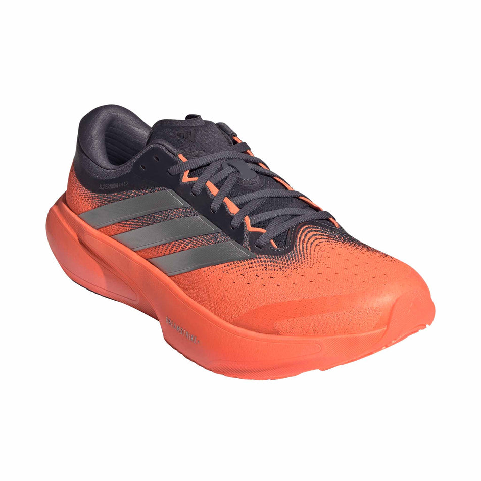 Lateral view of the right shoe from a pair of adidas Men's Supernova Rise 3 Running Shoes in the Aurora Onix/Silver met./Lucid Orange colourway.