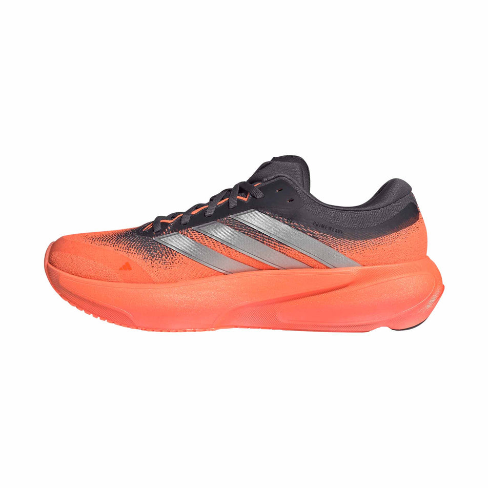 Medial view of the right shoe from a pair of adidas Men's Supernova Rise 3 Running Shoes in the Aurora Onix/Silver met./Lucid Orange colourway.