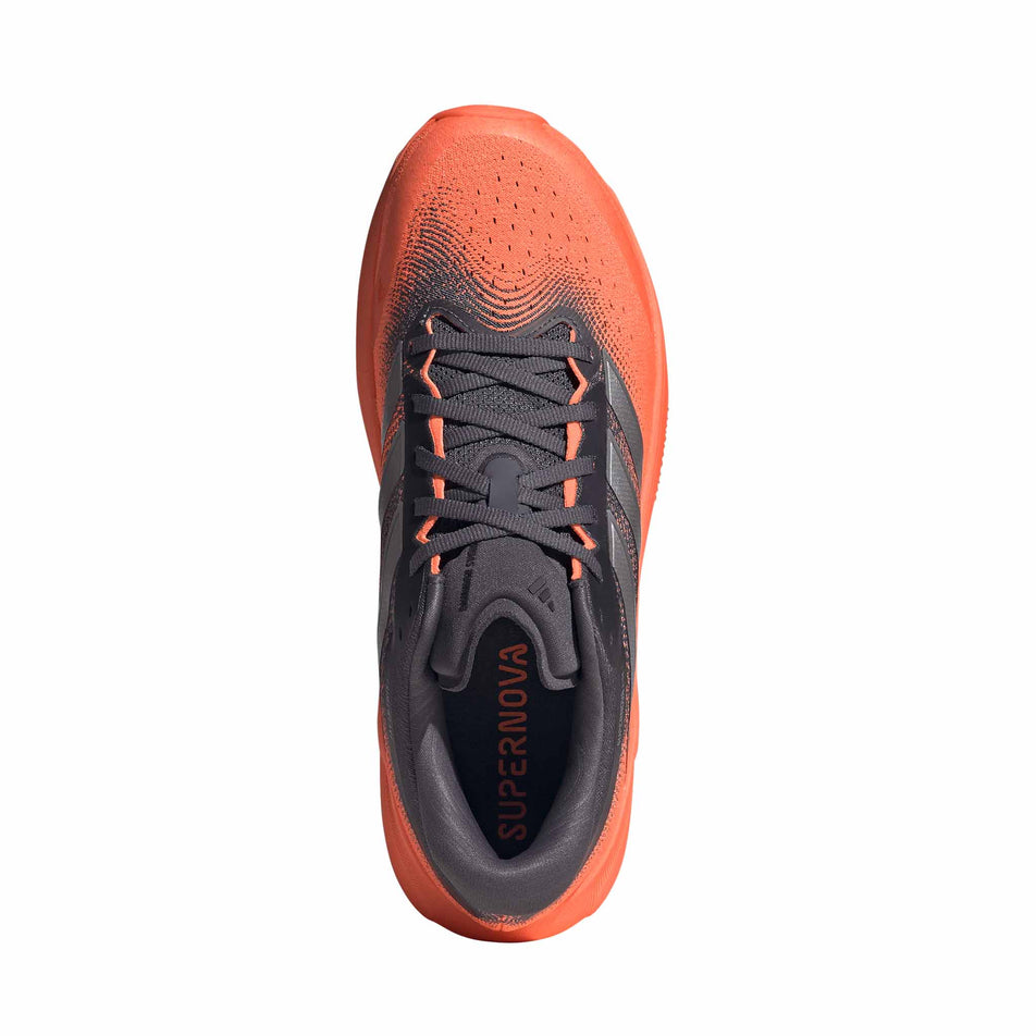 The upper of the right shoe from a pair of adidas Men's Supernova Rise 3 Running Shoes in the Aurora Onix/Silver met./Lucid Orange colourway.