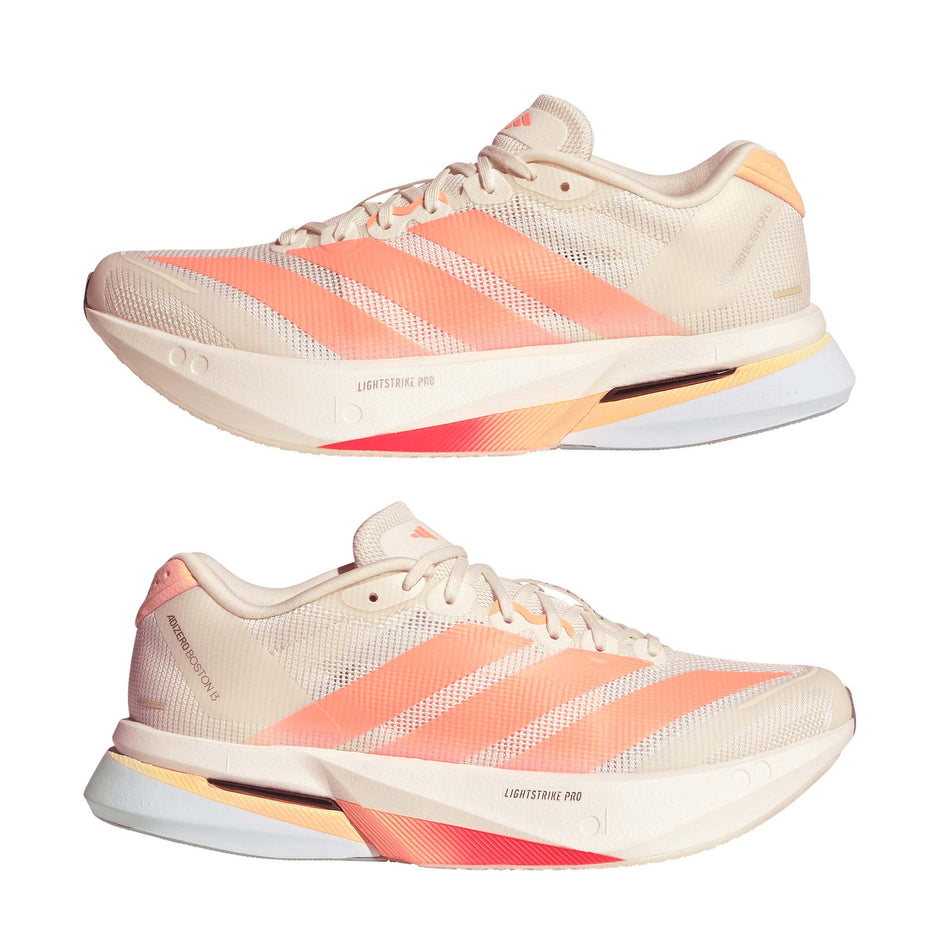 A pair of adidas Women's Adizero Boston 13 Running Shoes in the Off White/Beam Orange/Acid Orange colourway.
