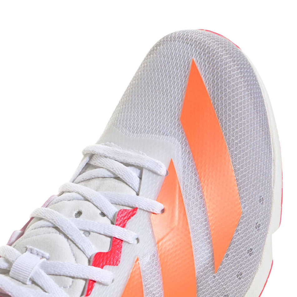 Close-up view of the toebox of the right shoe from a pair of adidas Distancestar Running Spikes in the Ftwr White/Lucid Orange/Lucid Red colourway.