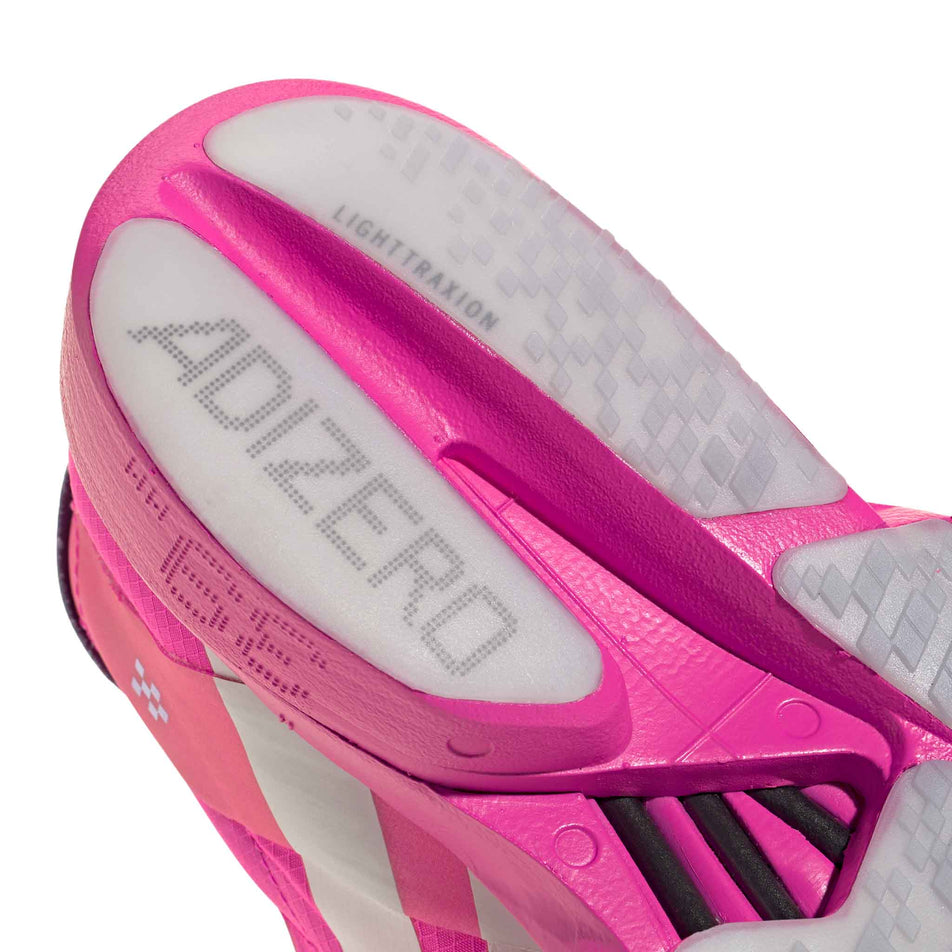 Close-up view of the outsole rubber on the adidas Women's Adizero Adios Pro 4 Running Shoes in the Shock Pink/Zero Met./Aurora Plum colourway. (8745995337890)