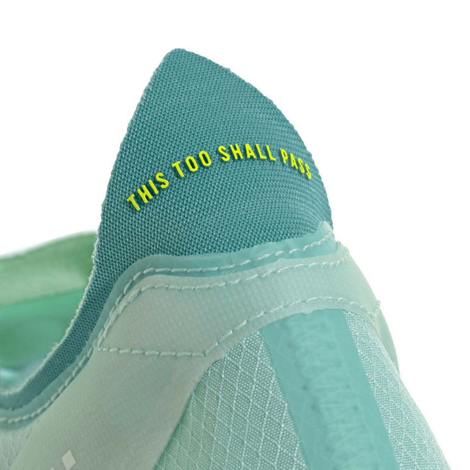 Close of the heel tab on the back of the shoe from a pair of adidas Women's Adizero Adios Pro 4 Running Shoes in the Semi Flash Aqua/Lucid Lemon/Mint Ton colourway. (8662550872226)