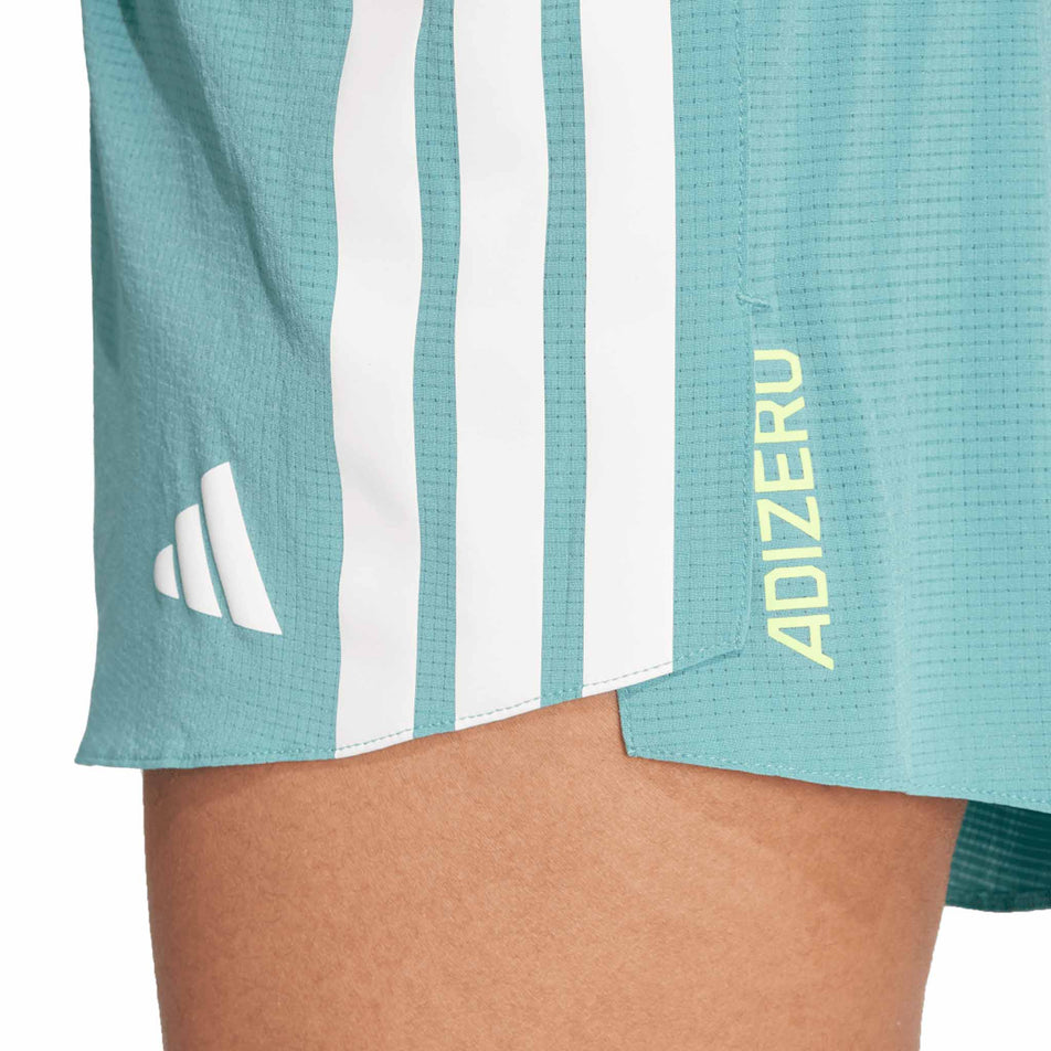 Close up side view of the adidas Women's Adizero Gel Short in the Powder Teal colourway. (8664880611490)