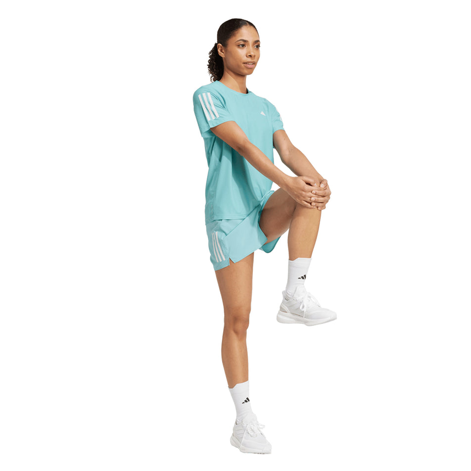 Front view of a model wearing the adidas Women's Own The Run Base Tee in the Mint Ton colourway. (8665229459618)