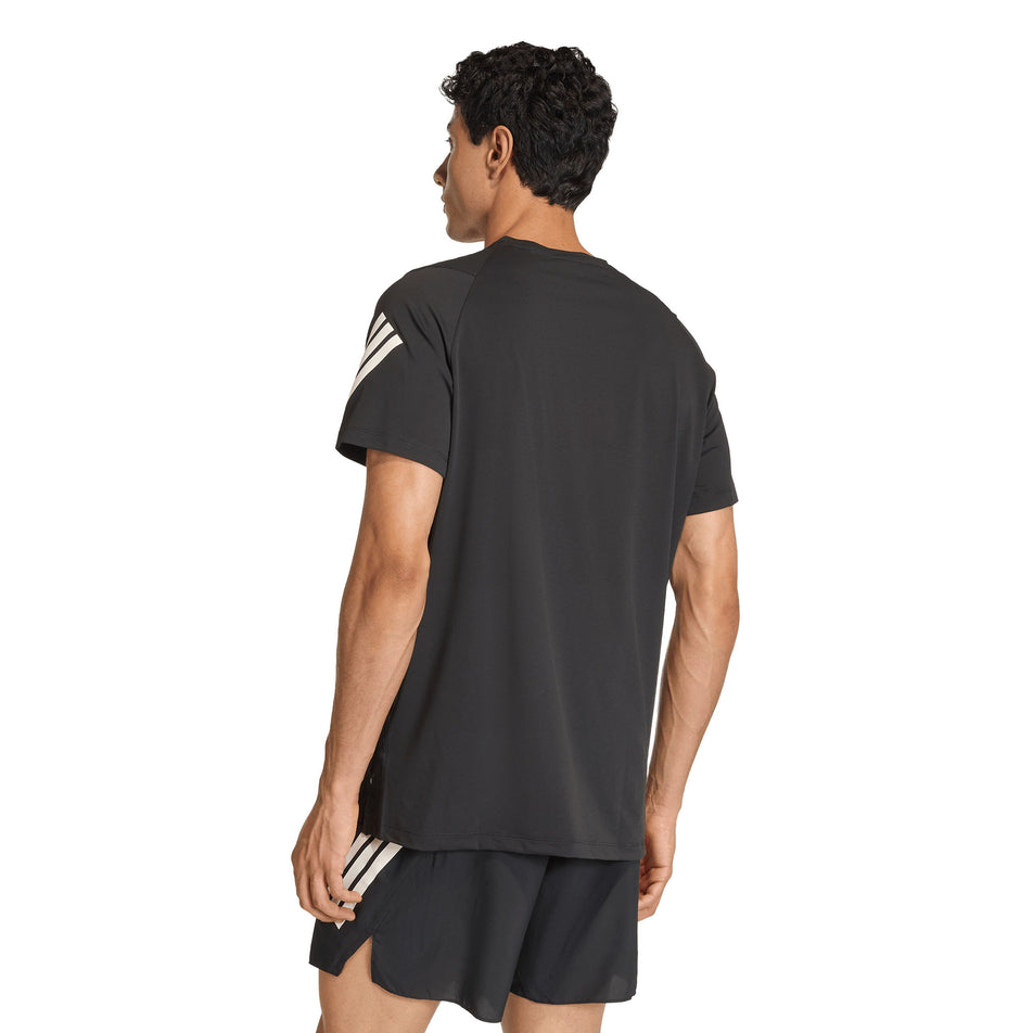 Back view of a model wearing the adidas Men's adi365 Tee in the Black colourway.