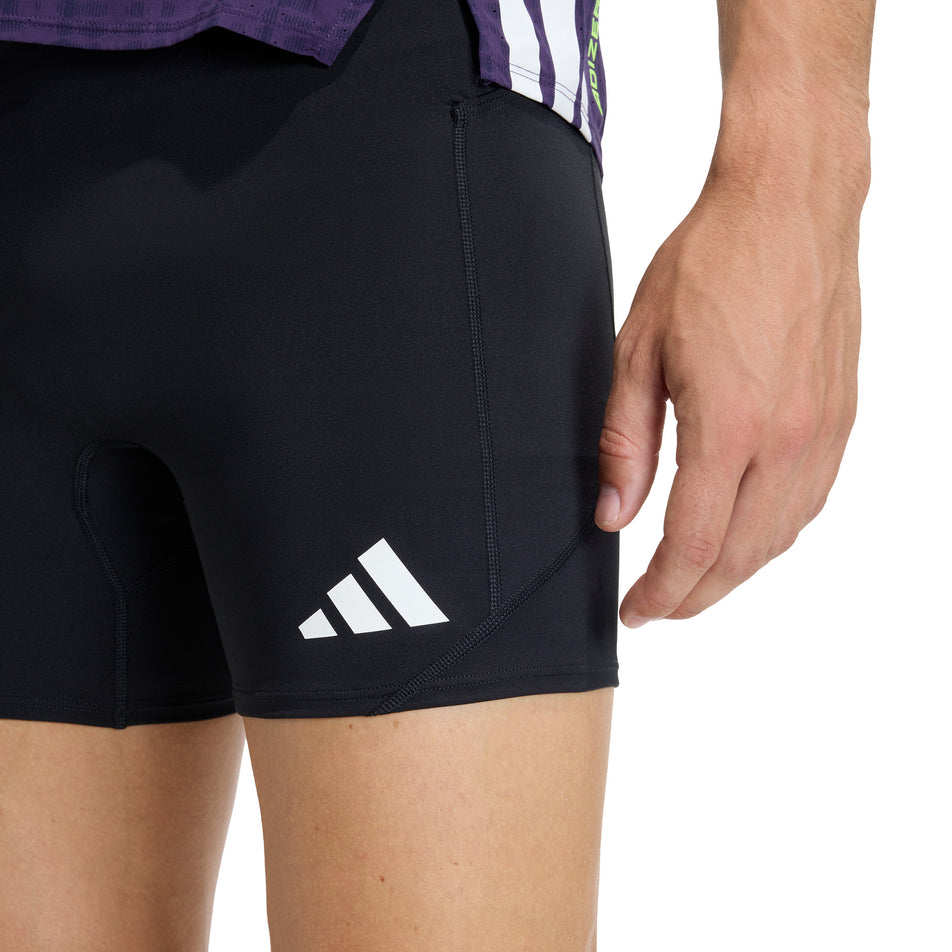 Front view of a model wearing the adidas Men's Adizero Running Short Pocket Tights in the Black colourway.